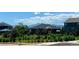 Community park and playground surrounded by beautiful landscaping and picturesque mountain views at 1860 Chaffee Crest Dr, Berthoud, CO 80513