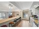 Kitchen and living room area with breakfast bar and view to the fireplace at 1173 Ski Hill Rd # 127, Breckenridge, CO 80424