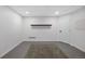 Finished basement with neutral gray carpet and flooring provides a versatile living space at 7863 Windfont Row, Parker, CO 80134