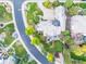 Aerial view of the property, highlighting the landscaping, circular driveway, and home's layout at 618 Fairchild Dr, Highlands Ranch, CO 80126