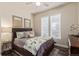 Comfortable bedroom with a stylish bed, decorative pillows, and natural light for a cozy retreat at 618 Fairchild Dr, Highlands Ranch, CO 80126