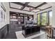 Office with custom built-ins, coffered ceilings, and large windows at 618 Fairchild Dr, Highlands Ranch, CO 80126