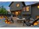 Back patio features a built-in grill, fire pit, and space to entertain at 12017 W Cross Dr, Littleton, CO 80127