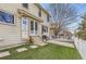 A backyard with a deck, patio, and lawn offers a versatile space for relaxation and outdoor activities at 3805 E 106Th Ave, Thornton, CO 80233
