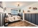 Stylish bedroom with unique wood trim and decorative accents at 3805 E 106Th Ave, Thornton, CO 80233