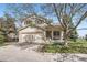 Charming two-story home featuring a well-maintained lawn, a two-car garage, and front porch with inviting curb appeal at 3805 E 106Th Ave, Thornton, CO 80233
