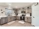 Modern kitchen with sleek countertops, stainless steel appliances, and stylish cabinetry offers a functional and appealing space at 3805 E 106Th Ave, Thornton, CO 80233