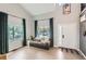 Bright living room features a vaulted ceiling, large windows, and modern decor, creating a welcoming and stylish space at 3805 E 106Th Ave, Thornton, CO 80233