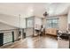 Open loft area with hardwood floors, natural light, and desk space at 3805 E 106Th Ave, Thornton, CO 80233