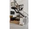 Bright living room with modern decor, staircase, and a comfortable seating area at 790 N Clarkson St # 206, Denver, CO 80218