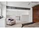 Bright open living space with comfortable seating, modern railing, and view of the outdoors at 790 N Clarkson St # 206, Denver, CO 80218