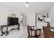 Stylish office space featuring unique decor, artwork, and a view into the hallway at 790 N Clarkson St # 206, Denver, CO 80218