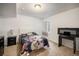 Spacious bedroom featuring a queen bed, a dedicated workspace, and a neutral color scheme at 5475 Shoshone Dr, Longmont, CO 80504