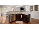 Kitchen featuring granite countertops, stainless steel appliances, and wood floors at 5475 Shoshone Dr, Longmont, CO 80504