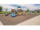 Community playground featuring a variety of equipment for , with slides, swings, and climbing structures at 5475 Shoshone Dr, Longmont, CO 80504