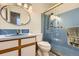 The bathroom is well lit with a glass shower door and gold trim at 2896 W 119Th Ave, Westminster, CO 80234