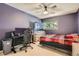 Bedroom with bed, desk, chair and television, perfect for relaxation and productivity at 2896 W 119Th Ave, Westminster, CO 80234