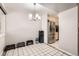 Dining area with stainless steel refrigerator and tile floors, perfect for gatherings at 2896 W 119Th Ave, Westminster, CO 80234