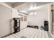 Bright dining area with tile floors, window and access to front door and kitchen at 2896 W 119Th Ave, Westminster, CO 80234