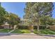 Inviting home with a manicured lawn, complemented by mature trees and steps to the front door at 2896 W 119Th Ave, Westminster, CO 80234