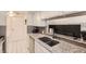 Clean and functional kitchen with modern sink and access to the living area at 2896 W 119Th Ave, Westminster, CO 80234