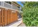 Cozy side yard enclosed by a wooden fence, offering privacy and a charming outdoor space at 2896 W 119Th Ave, Westminster, CO 80234