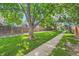 Tree lined sidewalk and green grass make for a lovely stroll at 2896 W 119Th Ave, Westminster, CO 80234