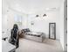 Spacious bedroom with a bed frame resembling riveted metal, and a gamer-style desk at 7033 E Lake Cir, Centennial, CO 80111