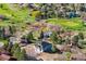 Expansive aerial view of the home with golf course views at 7778 Windwood Way, Parker, CO 80134