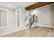 Finished basement area with wood and carpet flooring and modern staircase at 7778 Windwood Way, Parker, CO 80134
