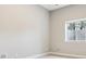 Bright bedroom with a garden-level window, offering a cozy and naturally lit space at 7778 Windwood Way, Parker, CO 80134