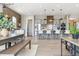 Spacious kitchen with a center island, barstool seating, and modern appliances at 7778 Windwood Way, Parker, CO 80134