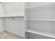 Spacious walk-in closet with ample shelving and hanging space, providing plenty of storage at 7778 Windwood Way, Parker, CO 80134