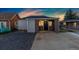 Cozy home exterior showcasing modern siding, a dark front door, and a well-maintained driveway at 109 S Fulton Ave, Fort Lupton, CO 80621