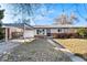 Lovely single-story home with a covered carport and tidy front yard, perfect for suburban living at 6880 W Airview Ave, Lakewood, CO 80232