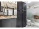 Bathroom features a granite vanity and shower at 2670 E Otero Pl # 11, Centennial, CO 80122