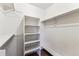 Walk-in closet features shelving and a bench at 2670 E Otero Pl # 11, Centennial, CO 80122