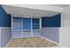 Basement featuring shelving, blue walls, and tile flooring at 416 Pluto Ct, Lone Tree, CO 80124