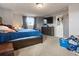 Bedroom featuring carpet flooring, and a large window providing natural light at 416 Pluto Ct, Lone Tree, CO 80124