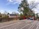 Wood deck with a wood fence in the background at 416 Pluto Ct, Lone Tree, CO 80124