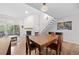 Bright living room with wood floors, a fireplace, and access to a balcony at 23551 Genesee Village Rd # H, Golden, CO 80401