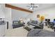 Comfortable living area with cozy seating, overhead beam and an abundance of space at 23551 Genesee Village Rd # H, Golden, CO 80401