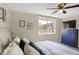 Bright bedroom with ample natural light from the large window at 3529 S Telluride Cir # D, Aurora, CO 80013