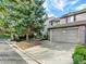 Well-maintained townhome with attached two-car garage and beautiful shade tree in front at 3529 S Telluride Cir # D, Aurora, CO 80013