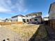 Large backyard with a patio and landscaping, perfect for outdoor entertaining at 25206 E Lake Dr, Aurora, CO 80016