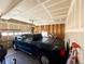 Spacious garage with a truck parked inside, offering ample storage and parking space at 25206 E Lake Dr, Aurora, CO 80016