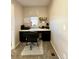 Functional home office with a desk, chair, storage, and natural light at 25206 E Lake Dr, Aurora, CO 80016