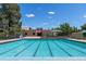 Large community pool with clear water and multiple swimming lanes on a sunny day at 2248 S Lincoln St, Denver, CO 80210