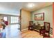 Inviting dining area featuring a table, chairs, and seamless access to the living area and kitchen at 9565 W Coal Mine Ave # A, Littleton, CO 80123