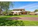 Beautiful backyard featuring a lush lawn and view of the home's exterior at 1354 S Macon St, Aurora, CO 80012